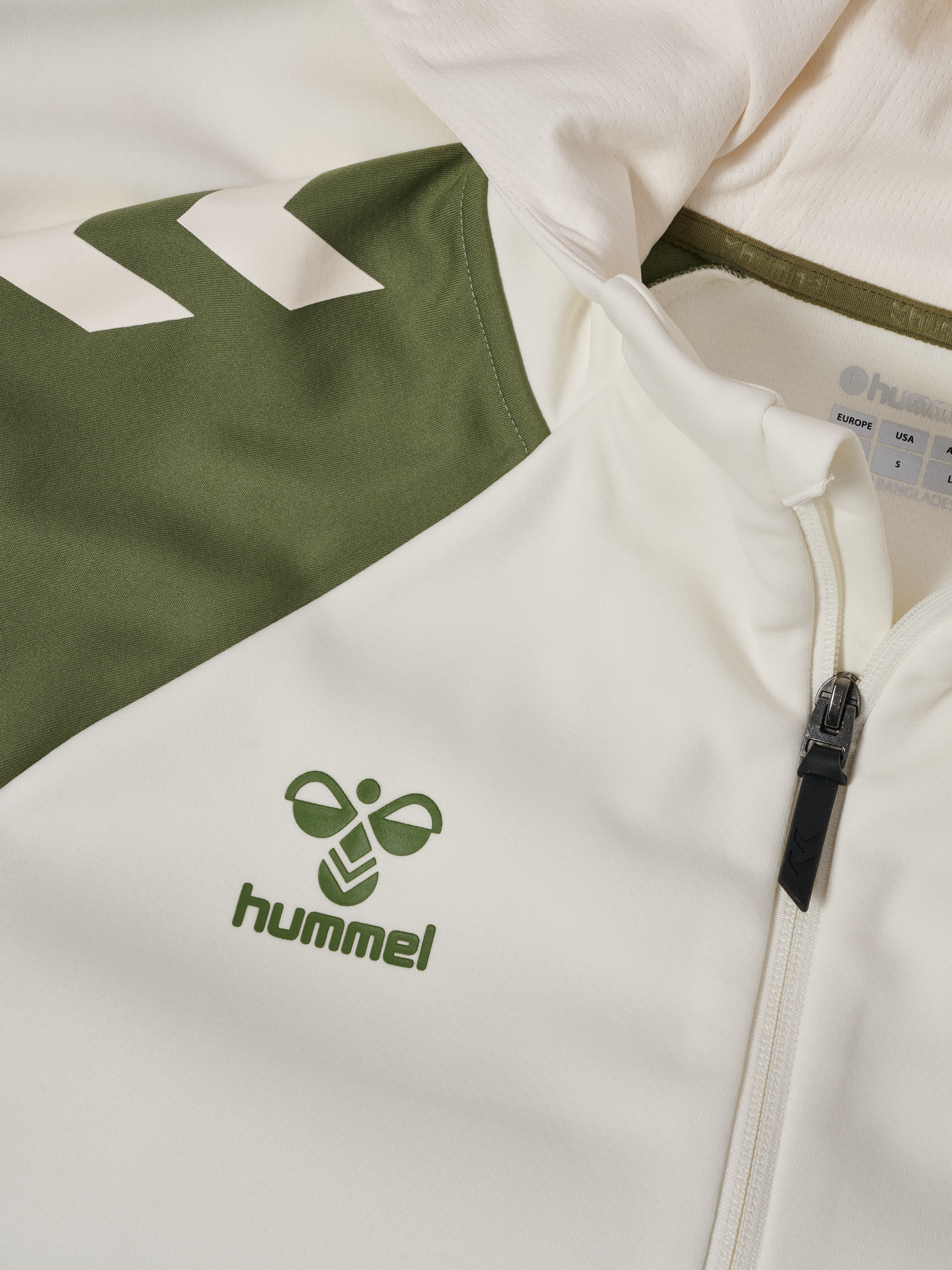 Veste zippée présentation crème 2025-2026